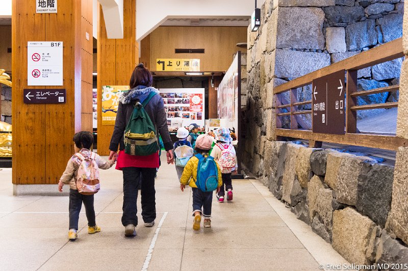20150312_103822 D4S.jpg - Children visiting museum area at Nagoya Castle.  Well-mannered and quite interested in what they see.